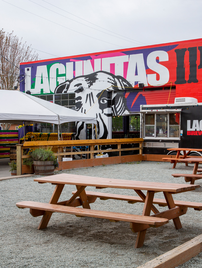 Lagunitas Brewing Company Seattle Taproom Beer Garden with dog mural